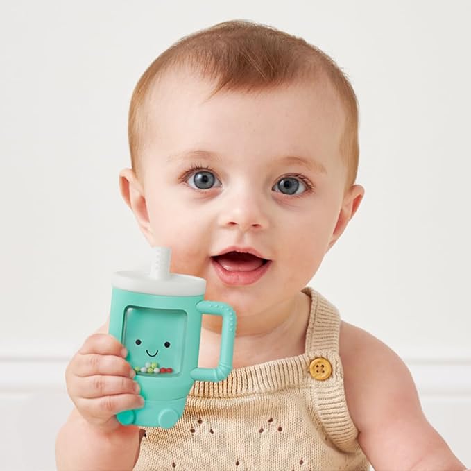 Itzy Ritzy Silicone Rattle Teether– BPA-Free Silicone Teether with Rattle for Babies & Toddlers – Features a Gentle Rattle Sound, Colorful Beads & Multiple Textures (Travel Cup)