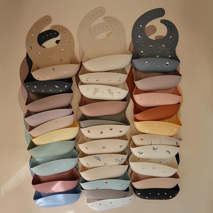 mushie Silicone Baby Bib | Adjustable Fit Waterproof Bibs (Cherries)