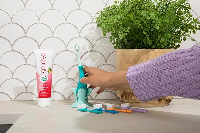 RADIUS Toddler Toothbrush & Toothpaste Bundle for Kids, 2 Pack Totz Plus Silky Soft Brush in White/Coral & Cool Grey/Amethyst Purple and 1 Count Dragon Fruit Toothpaste, for Children 18 Months & Up