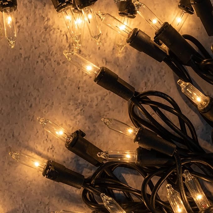 YULETIME Clear Christmas Lights with Black Wire, Pack of 2 Strands 33 Ft 100 Count UL Certified Incandescent Mini String Lights (Clear - Black Wire)